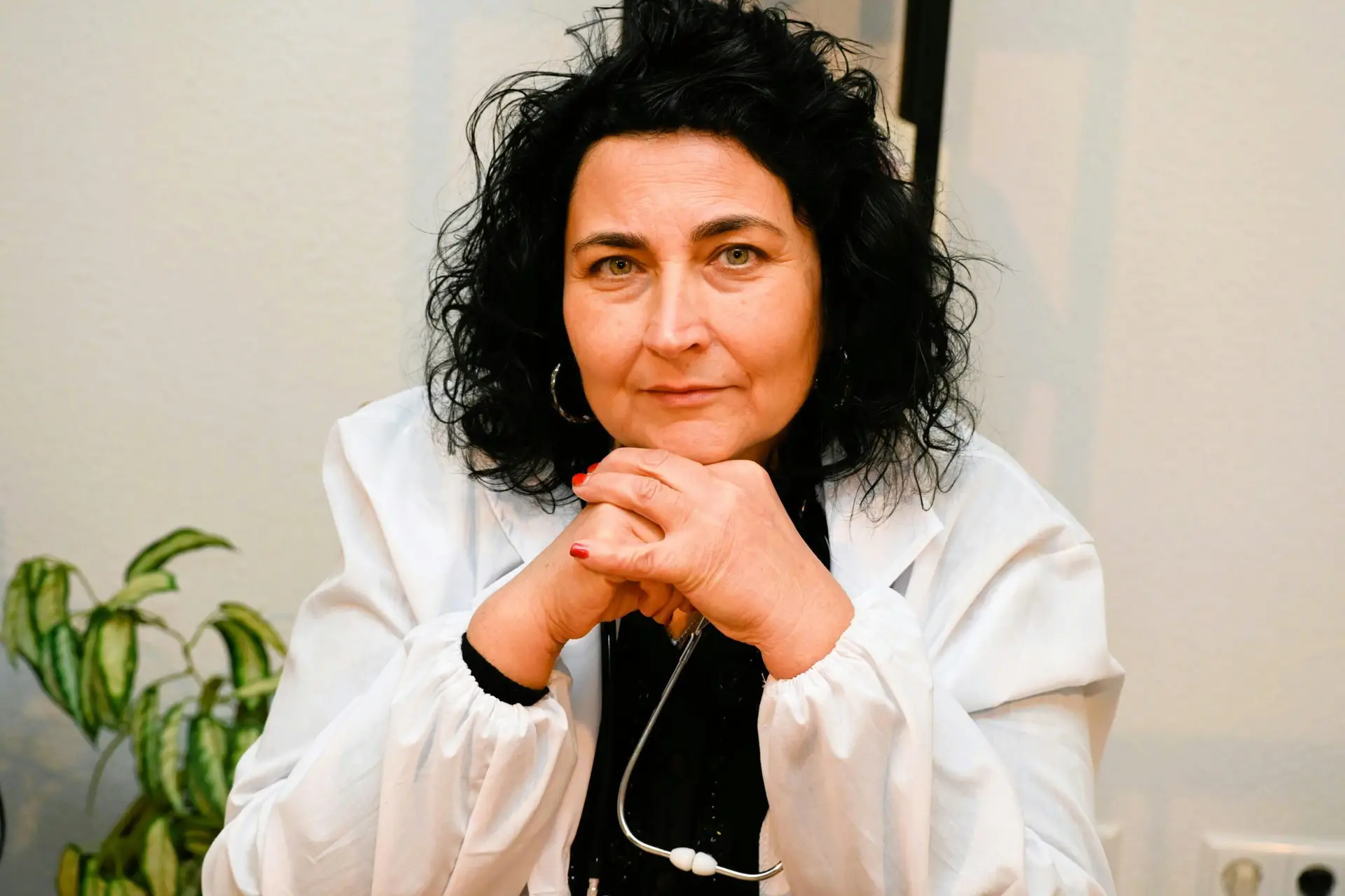 Female doctor in a medical office in Weinstadt, Germany, exemplifying professionalism and care.